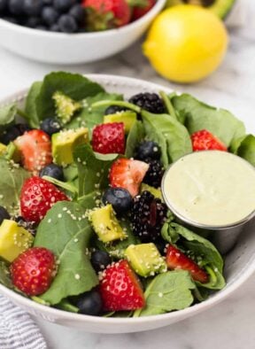 A perfect easy & light end of summer dish, this Berry Avocado Salad with Creamy Matcha Dressing packs the nutrients & is paleo, vegan, dairy free, & Whole30 approved! - Eat the Gains