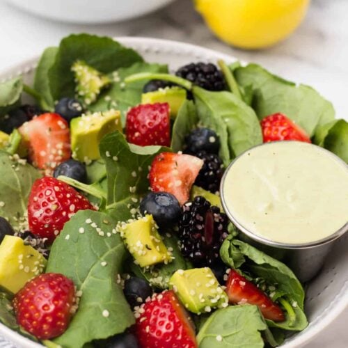 A perfect easy & light end of summer dish, this Berry Avocado Salad with Creamy Matcha Dressing packs the nutrients & is paleo, vegan, dairy free, & Whole30 approved! - Eat the Gains