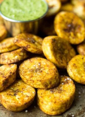 A great carb source, these Sweet & Spicy Baked Plantains are an easy side for breakfast or dinner and are paleo, vegan, and Whole30 approved! - Eat the Gains