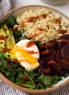 Beet Quinoa Breakfast Bowls come together in under 10 mins and make a healthy and easy gluten free and vegetarian breakfast - great for meal prep or on-the-go! - Eat the Gains