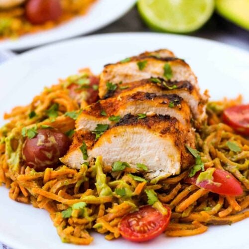 One pan & 30 minutes for this Chili Dusted Chicken & Sweet Potato Noodles with Avocado Sauce. Packed with protein, carbs, and healthy fats to make an easy gluten free, paleo, and Whole30 approved dish - Eat the Gains