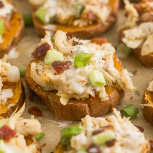 Whole30 pizza on sweet potato rounds with chicken, bacon, and ranch on top.