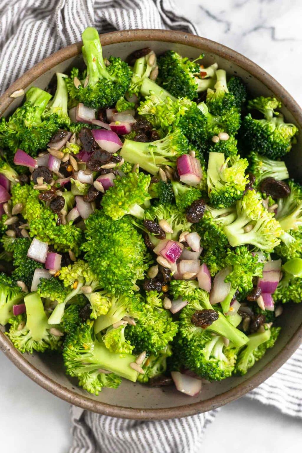 Healthy Broccoli Salad with Raisins (No Mayo!) Eat the Gains