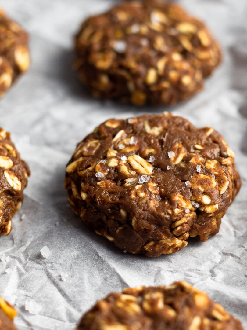 No bake protein cookies sprinkled with flaky sea salt on a baking sheet.