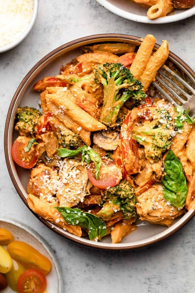 https://eatthegains.com/wp-content/uploads/2023/06/Protein-Pasta-Recipes-8-683x1024.jpg