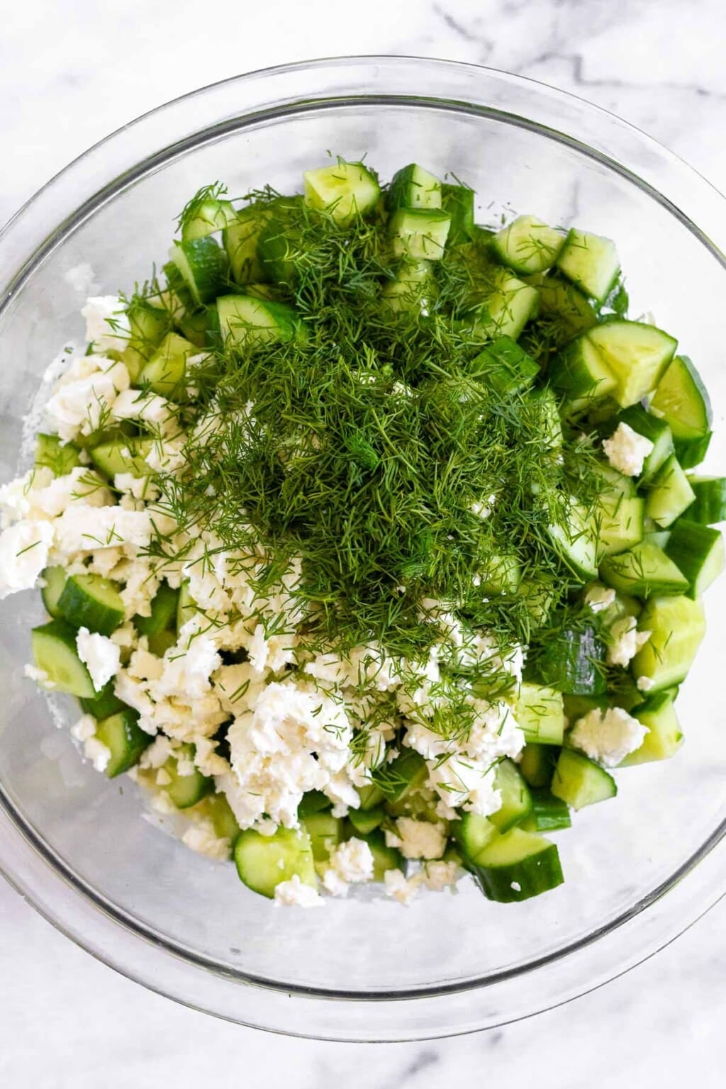 Creamy Cucumber Yogurt Salad w/ Feta & Dill - Eat the Gains