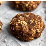 No bake protein cookies sprinkled with flaky sea salt on a baking sheet.